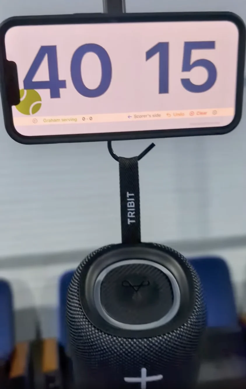 Front view of the Bluetooth speaker hanging from the S hook