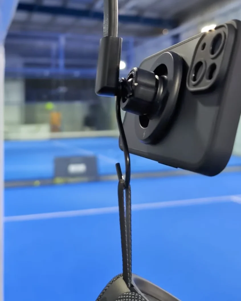 Side view of the Bluetooth speaker hanging from the S hook